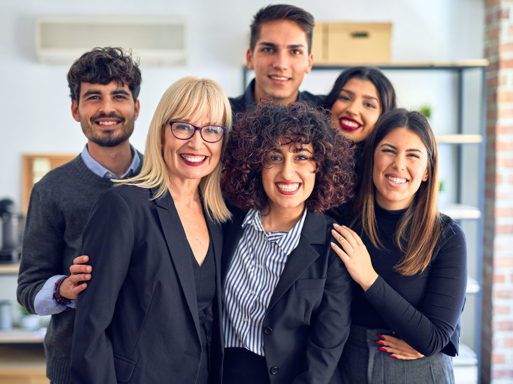 Alejandro Fuentes et al. posing for the camera